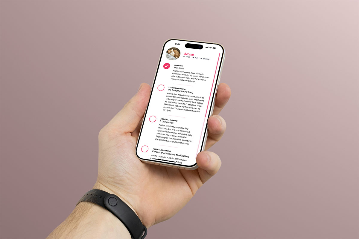Person holding iphone with app open.