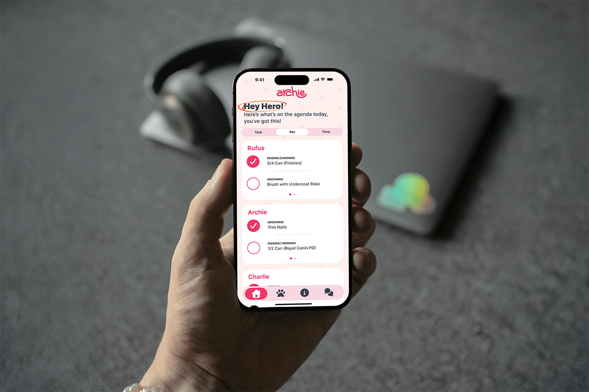 Person holding iphone with app open.